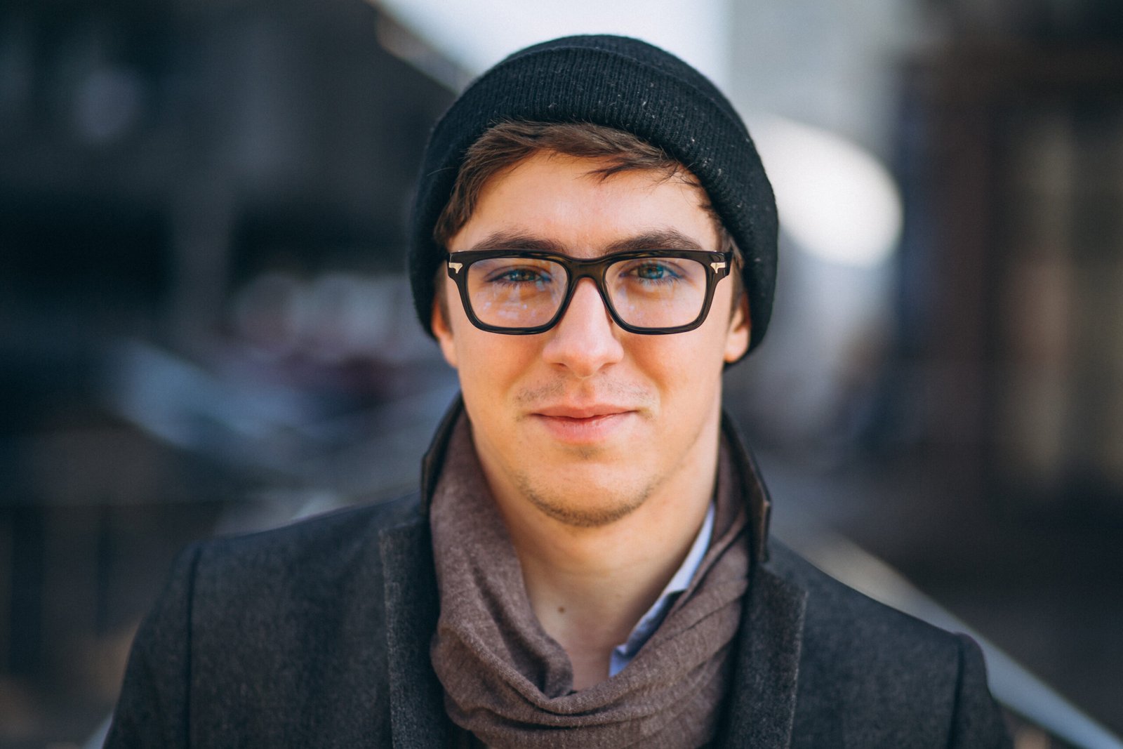 Business man by the skyscraper